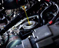 Pouring Synthetic Oil Into Motor
